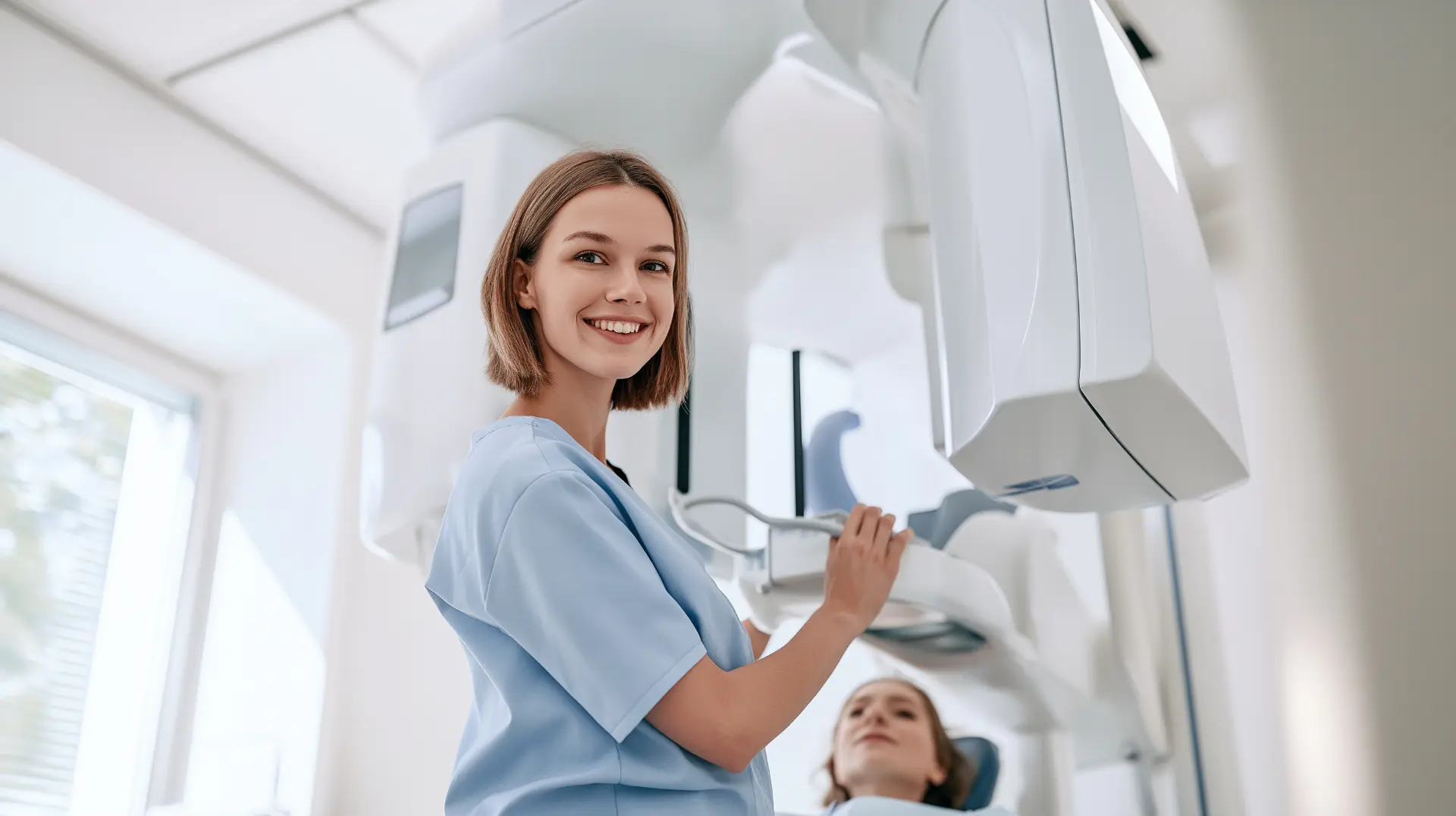 Technician performing a dental CBCT scan, a common add-on cost in a dental implant estimate