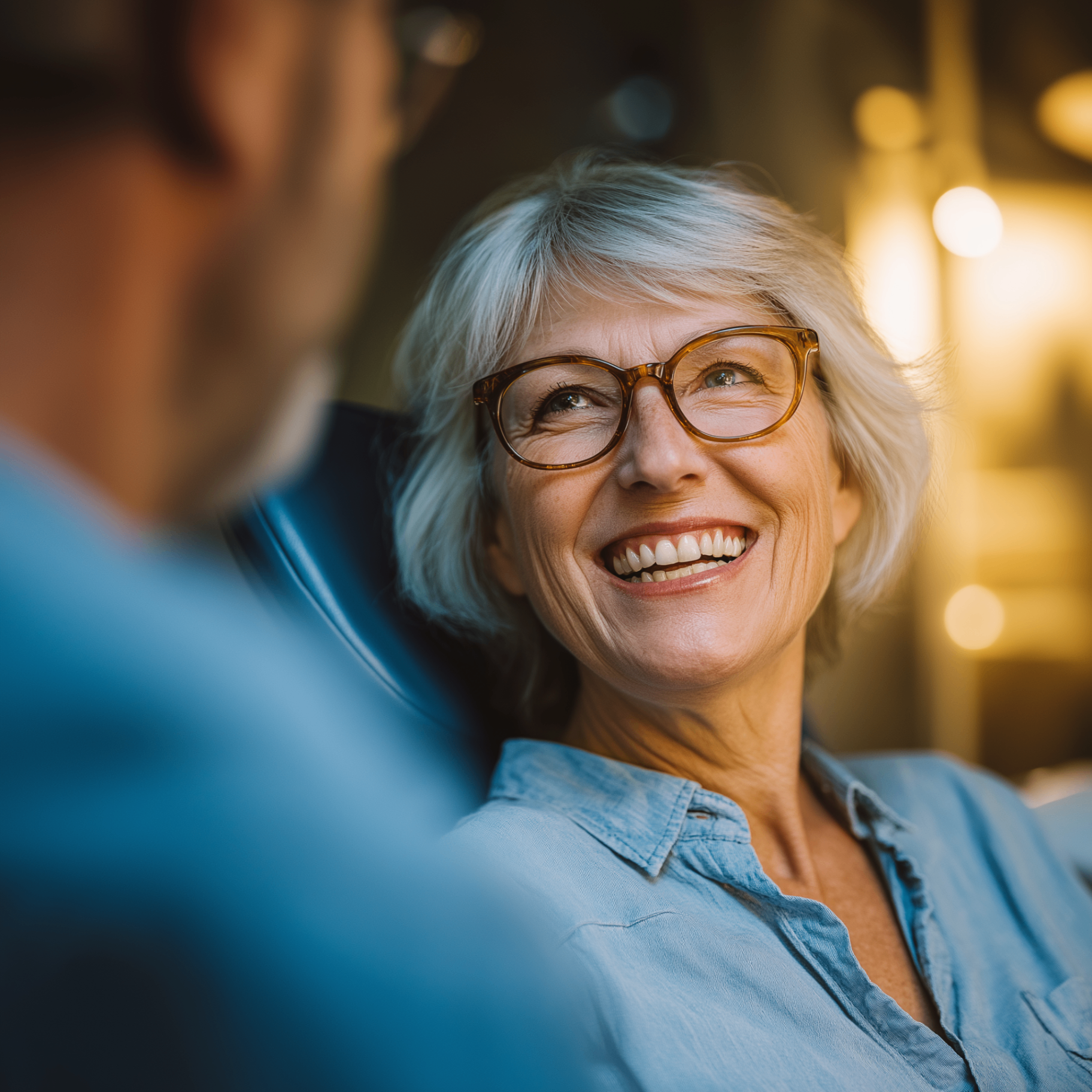 Patient consulting with dentist about All-on-4 dental implants